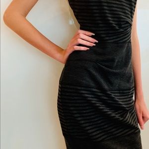 Figure flattering sleeveless Nicole Miller dress